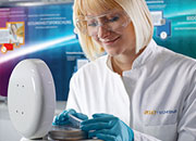 Caption: female scientist working in the lab